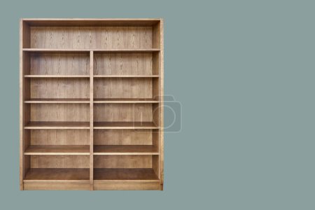 Wooden bookcase made of toned ash veneered MDF isolated on green background