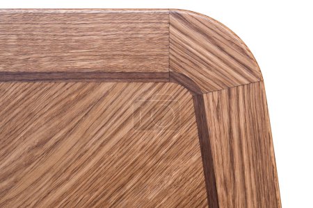 Close-up of wooden tabletop made from solid oak and oak veneer of marquetry technique with clear varnish finish isolated on white background
