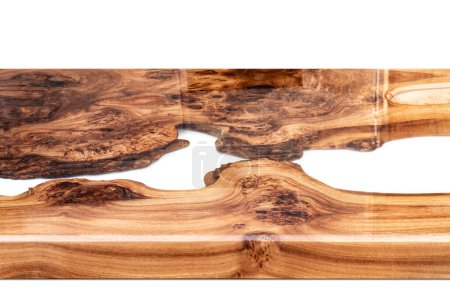 Live edge elm burl slab table top with central epoxy resin river on white background, combining natural wood with a synthetic material