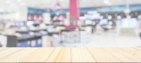 Photo for Wood table top with blur electronic department store show Television TV and home appliance background for product display - Royalty Free Image