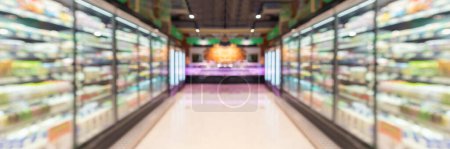 Photo for Supermarket grocery store aisle and shelves blurred background - Royalty Free Image