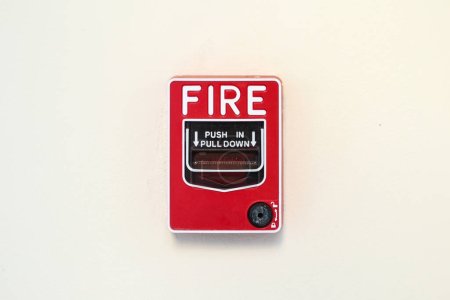 Foto de Fire alarm switch on white wall background - Imagen libre de derechos