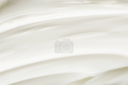 Foto de White lotion beauty skincare cream texture cosmetic product background - Imagen libre de derechos