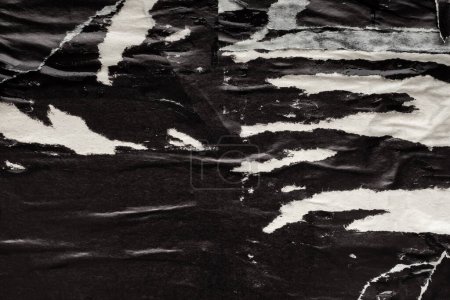 Foto de Antiguo grunge rasgado desgarrado papel negro cartel superficie textura fondo - Imagen libre de derechos