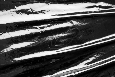 Téléchargez les photos : Film plastique transparent noir envelopper fond texture superposition - en image libre de droit