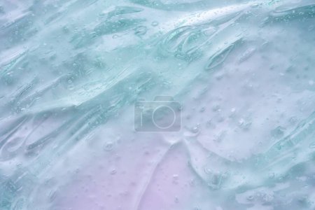 Photo for Transparent clear blue liquid serum gel cosmetic texture background - Royalty Free Image