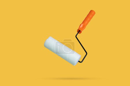 Photo for White paint roller floated on yellow background - Royalty Free Image