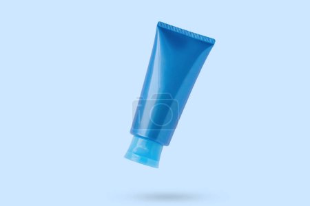 Blank blue cosmetic tube mockup isolated on blue background