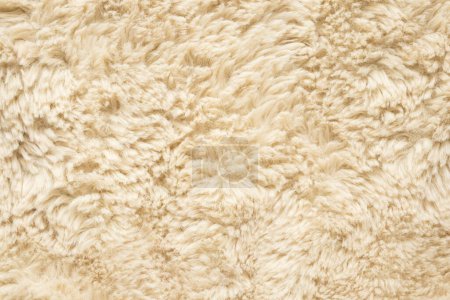 Téléchargez les photos : Tissu fourrure moelleux brun texture laine fond - en image libre de droit