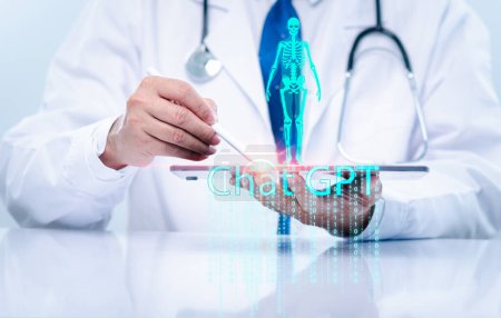 Foto de Doctor man holds a tablet uses Chat GPT on virtual screen for checking disease in laboratory of hospital. virtual x-ray from Chat GPT shows analysis disease. physician do diagnostic infections with Ai - Imagen libre de derechos