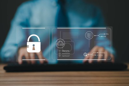 Users enhance cyber protection by typing secure login credentials, incorporating two-factor authentication for additional layer of safety when accessing secured login form, ensuring protected access-stock-photo