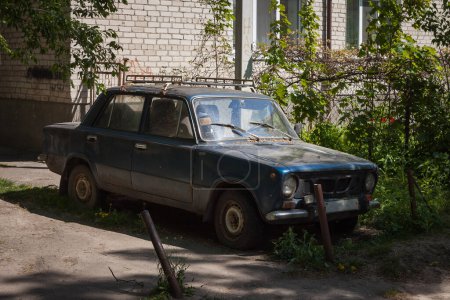 Photo for Lutsk, Ukraine - May 12, 2023: The old Soviet car VAZ 2101 is parked in the yard - Royalty Free Image