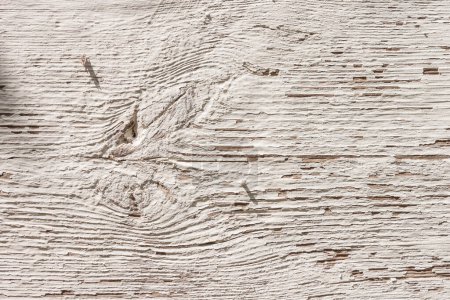 Bemalte weiße Holzwand des Hauses. Detaillierte Textur einer alten Holzoberfläche. Nahaufnahme,