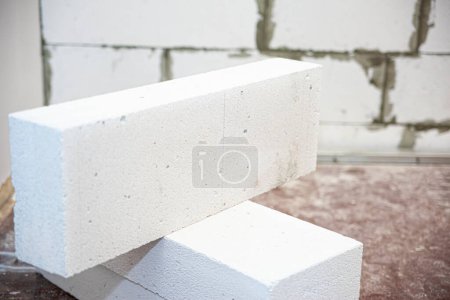 Photo for Construction of a house from gas block or foam block. Concept of construction and reconstruction - Royalty Free Image