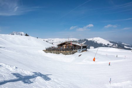 Photo for Pass Thurn, Austria - Restaurant for skiers on a ski slope with snow in the mountains in winter. - Royalty Free Image