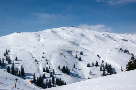 Photo for Ski resort with slopes in Austrian Alps in winter with snow. - Royalty Free Image