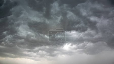 Photo for Dark storm clouds before a thunder-storm. Panoramic image. - Royalty Free Image