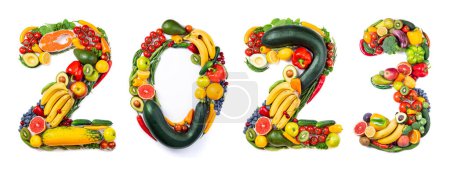 New year 2023 food trends. New Year 2023 made of vegetables, fruits and fish on white background. New years 2023 healthy food. 2023 resolutions, trends, healthy eating, sustainable, goals concep