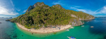 Photo for Drone panorama of the paradisiacal Seven Commandos beach near El Nido on the Philippine island of Palawan during the day - Royalty Free Image