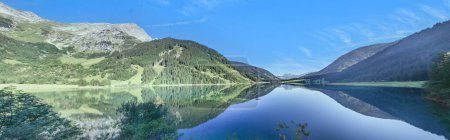 Photo for Panoramic view over Vilsalpsee lake in Tannheimer Tal valley, Austria during daytime - Royalty Free Image