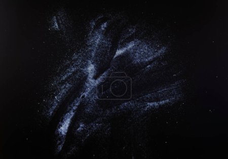 Photo for Abstract white dust on a black background. - Royalty Free Image