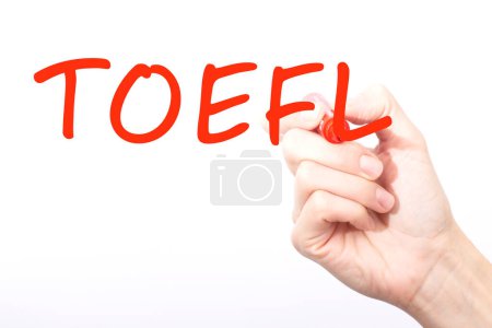 Foto de Inscripción de escritura a mano TOEFL con marcador de color rojo, concepto - Imagen libre de derechos