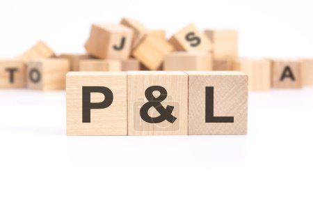 text PL - Profit and Loss - written on wooden cubes on white background