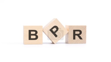 word BPR made with wood building blocks, white background.