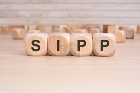 la palabra SIPP está escrita en un bloque de madera. alta calidad