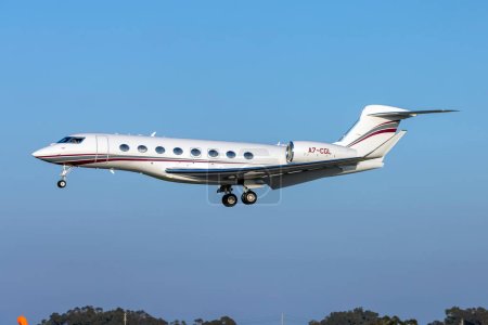 Photo for Luqa, Malta - February 20, 2023: Qatar Executive Gulfstream G650ER (Reg: A7-CGL) on short finals runway 31 in the afternoon. - Royalty Free Image