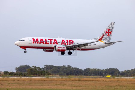 Photo for Luqa, Malta - June 23, 2023: Malta Air Boeing 737-8 MAX 200 (REG: 9H-VUC) landing in the late evening. - Royalty Free Image