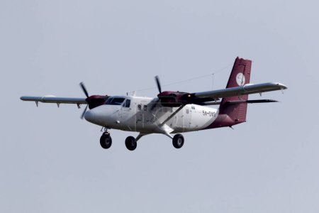 Photo for Luqa, Malta January 31, 2015: Petro Air De Havilland Canada DHC-6-300 Twin Otter (REG: 5A-DAS) on short finals runway 31, arriving from Libya. - Royalty Free Image