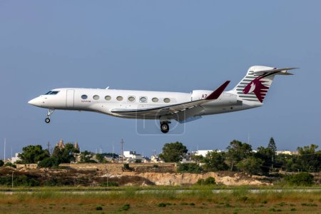 Photo for Luqa, Malta - July 1, 2023: Qatar Executive Gulfstream G650ER (Reg: A7-CGB) on finals runway 31. - Royalty Free Image