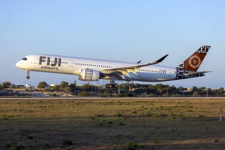 Photo for Luqa, Malta - August 2, 2023: Fiji Airways Airbus A350-941ACJ (REG: F-WJKN) landing after a 2 hour test flight. To be registered DQ-FAM when in service with Fiji Airways. - Royalty Free Image