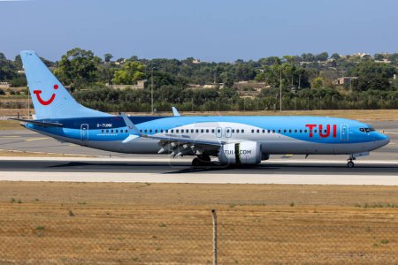 Photo for Luqa, Malta - August 3, 2023: TUI Boeing 737-8 MAX (Reg: G-TUMK) arriving from Bristol as flight BY6406. - Royalty Free Image