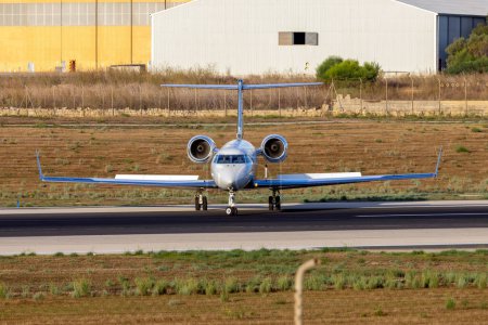 Photo for Luqa, Malta - September 16, 2023: Gulfstream Aerospace G-IV-X Gulfstream G450 (REG: N455FX) turning on the runway for take off. - Royalty Free Image