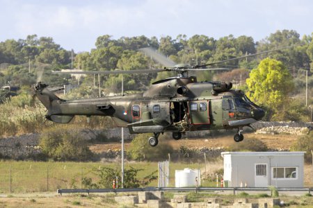 Photo for Luqa, Malta - September 25, 2023: Dutch Air Force Eurocopter AS-532U2 Cougar Mk2 (REG: S-419) departing runway 31. - Royalty Free Image