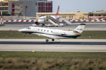 Photo for Luqa, Malta - November 28, 2023: Cessna 560XL Citation XLS Plus (REG: OK-BIZ) lifting off from runway 31. - Royalty Free Image