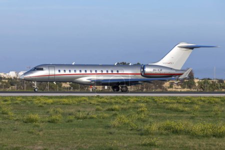 Photo for Luqa, Malta - December 12, 2023: VistaJet Bombardier BD-700-1A10 Global 6000 (Reg: 9H-VJR) taking off from runway 31 in the evening. - Royalty Free Image