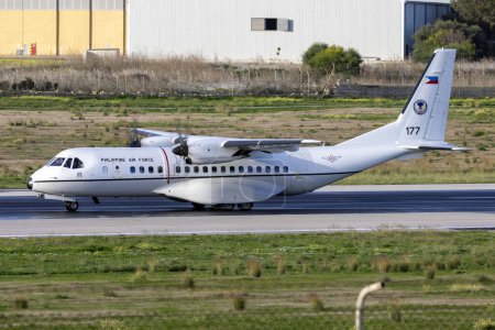 Photo for Luqa, Malta - December 15, 2023: Philippines Air Force Airbus C-295M (Reg.: 177) departing on its ferry flight after a night stop. - Royalty Free Image