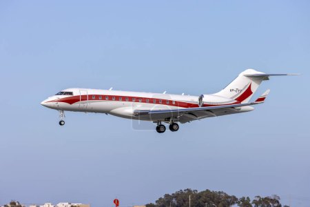 Photo for Luqa, Malta - March 24, 2024: Gama Cayman Bombardier Global Express XRS (BD-700-1A10) (REG: VP-CYT) landing on a sunny afternoon. - Royalty Free Image