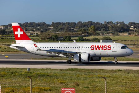 Photo for Luqa, Malta - April 3, 2024: Swiss International Air Lines Airbus A320-271N (REG: HB-JDF) landing runway 31. - Royalty Free Image