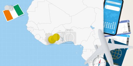 Reisen an die Elfenbeinküste Konzept, Karte mit Pin auf Karte der Elfenbeinküste. Reiseplan, Flagge, Reisepass und Tickets für die Urlaubsvorbereitung.