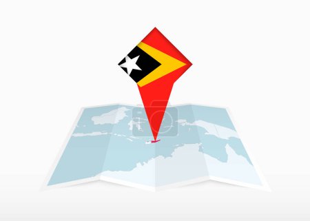 Illustration for East Timor is depicted on a folded paper map and pinned location marker with flag of East Timor. - Royalty Free Image