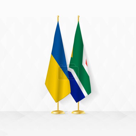 L'Ukraine et l'Afrique du Sud drapeaux sur le stand du drapeau, illustration de la diplomatie et autre rencontre entre l'Ukraine et l'Afrique du Sud.