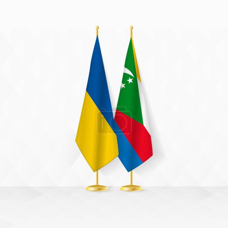 Flaggen der Ukraine und der Komoren am Fahnenständer, Illustration für Diplomatie und andere Treffen zwischen der Ukraine und den Komoren.