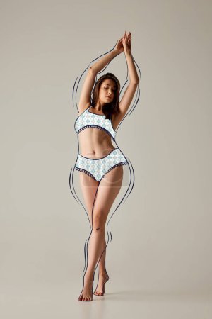 Natural beauty. Artwork with young slim girl wearing drawn underwear isolated over light background. Drawings of overweight lines around body. Concept of health, dieting, weight loss concept