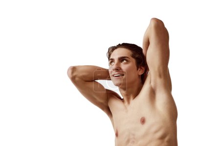 Photo for Portrait of young muscular man posing shirtless isolated over white background. Wellness. Concept of male beauty, fitness, sport, skincare, cosmetology, spa, body care. Copy space for ad - Royalty Free Image