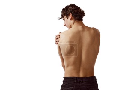 Photo for Back view portrait of young shirtless man with muscular body isolated over white background. Relief body. Concept of male beauty, sport, skincare, cosmetology, spa, body care. Copy space for ad - Royalty Free Image