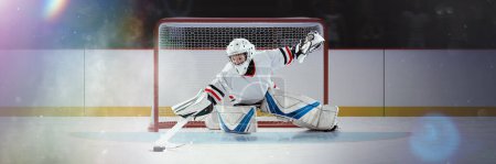 Photo for Boy, teen, professional hockey player in motion, playing, training over ice rink. Goaltender position. Concentration. Sport, action, game, strength, championship and competition concept - Royalty Free Image